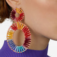 Load image into Gallery viewer, Hollow Dyed Straw Earrings
